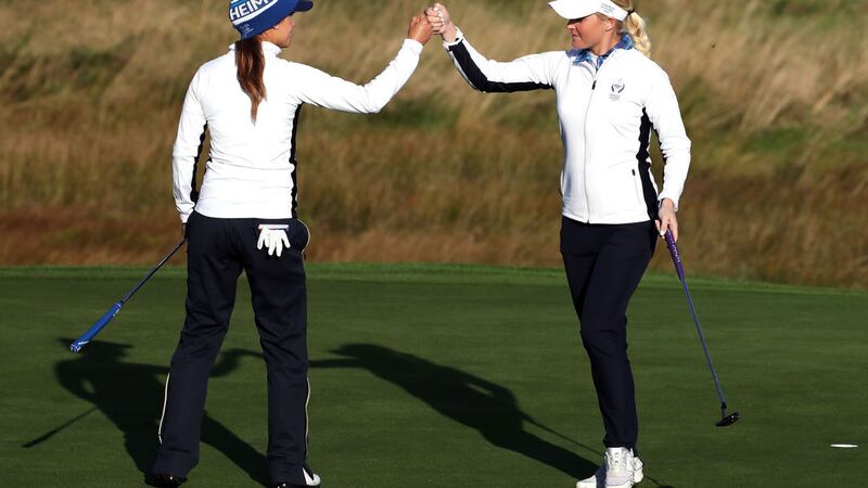 Charley Hull and Azahara Munoz let slip a commanding lead in the fourballs