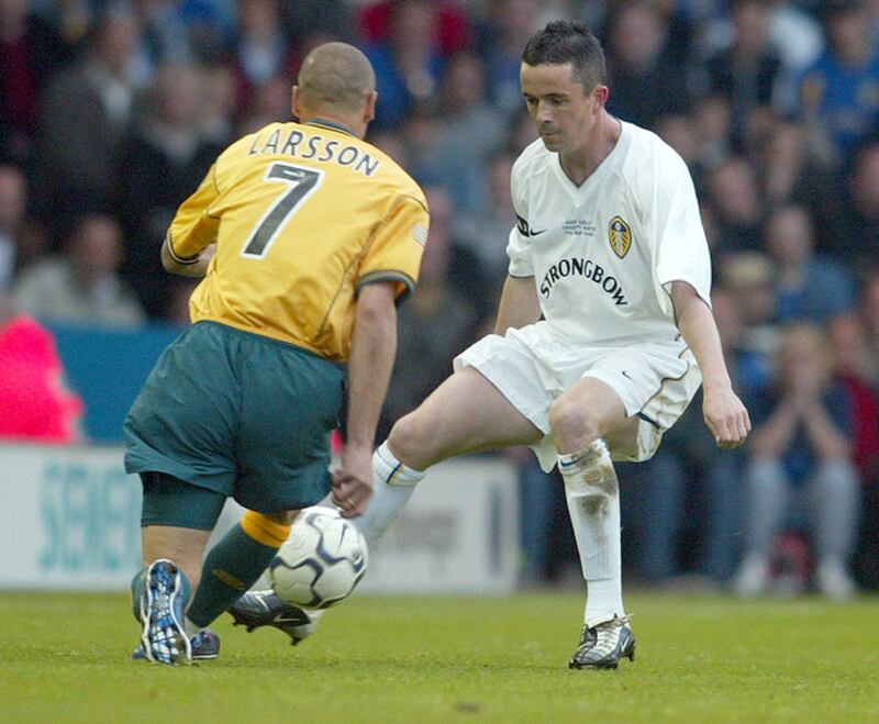 Leeds United's Gary Kelly and Celtic's Henrik Larsson challenge for the ball at Elland Road, Leeds during Gary Kelly's testimonial match Tuesday May 7 2002. Picture by: Phil Noble&nbsp;(PA)