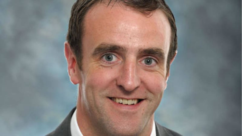 Minister Mark H Durkan said he will &quot;continue to ensure that people get the benefit of the levy&quot;. 