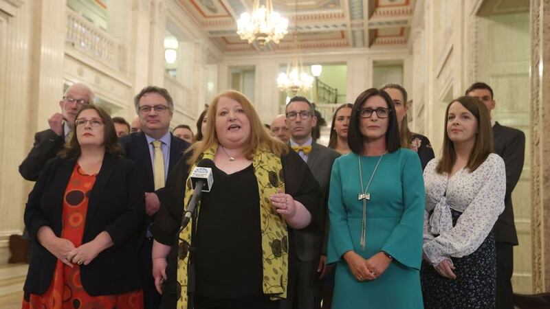 &nbsp;Alliance Party leader Naomi Long with her party's newly elected MLAs in the Great Hall of Parliament Buildings at Stormont