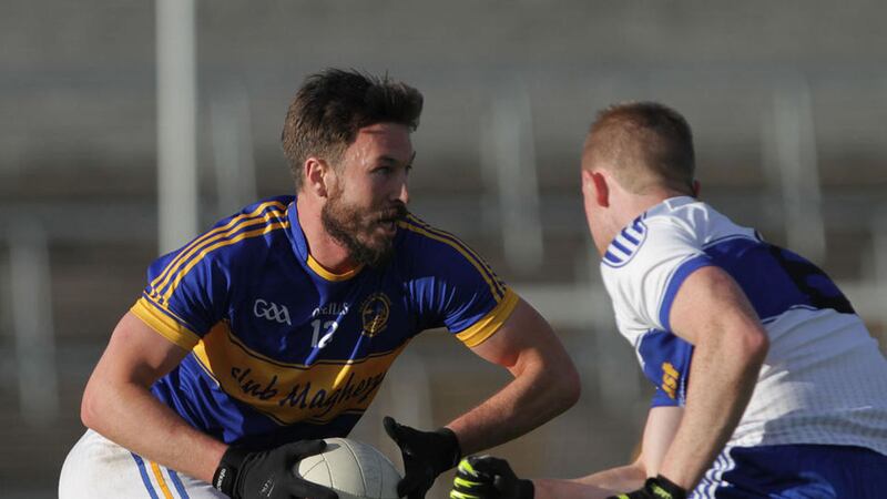 Maghery's Stefan Forker comes up against Dromintee's Conor Hoye at the Athletic Grounds<br />Picture by Colm O'Reilly