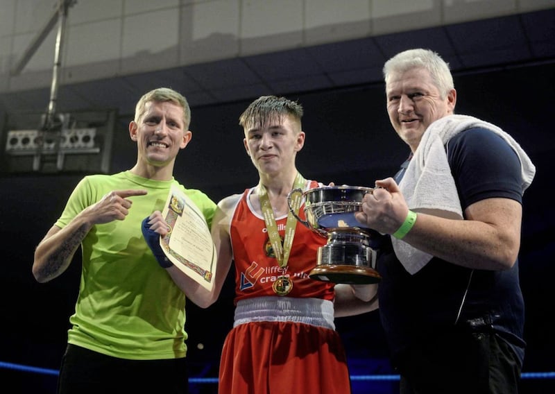Newly-crowned Irish flyweight champion Jude Gallagher with coach Eric Donovan and father/coach John Gallagher. Picture by Mark Marlow 