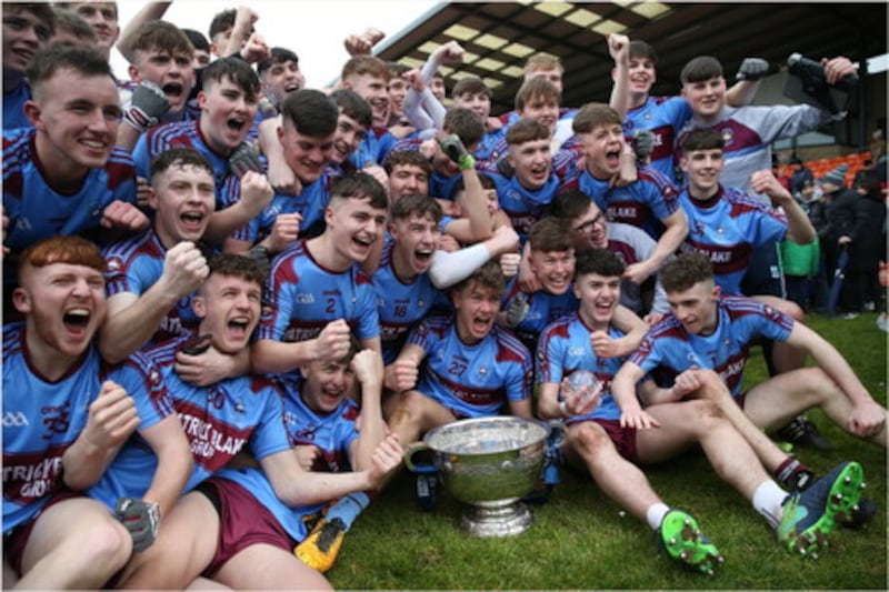 The St Michael's College, Enniskillen players celebrate their 2019 MacRory Cup triumph. Picture by Hugh Russell