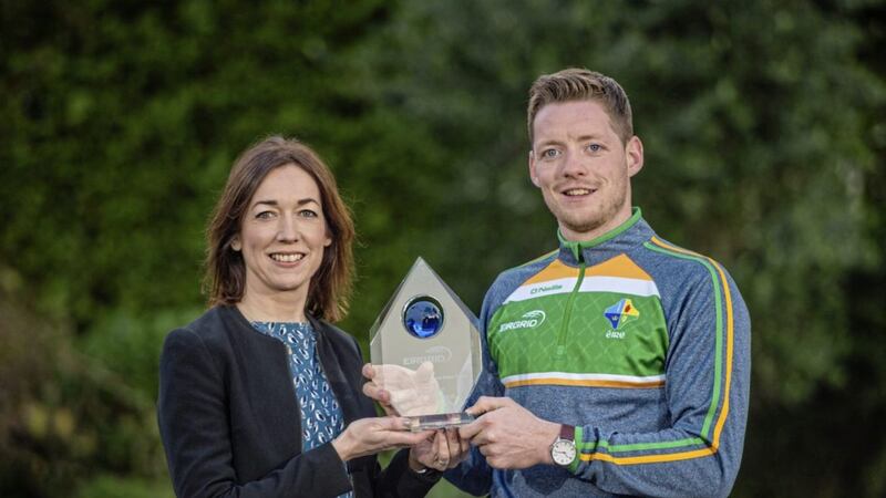 Conor McManus was presented with the Irish International Rules Player of the Series trophy by EirGrid yesterday. McManuswas selected by the public for his performances during the Irish team&#39;s trip to Australia. As part of the prize, EirGrid donated a cheque for &euro;1,000 to his club, Clontibret. Pictured with the Monaghan forward is Valerie Hedin, external communications manager at EirGrid. Photo by Cody Glenn/Sportsfile 