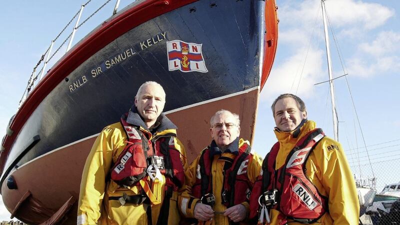 Billy McAllister, centre, with Larne RNLI coxswains during a visit to Donaghadee in 2013 for the 60th anniversary of the Princess Victoria ferry disaster 
