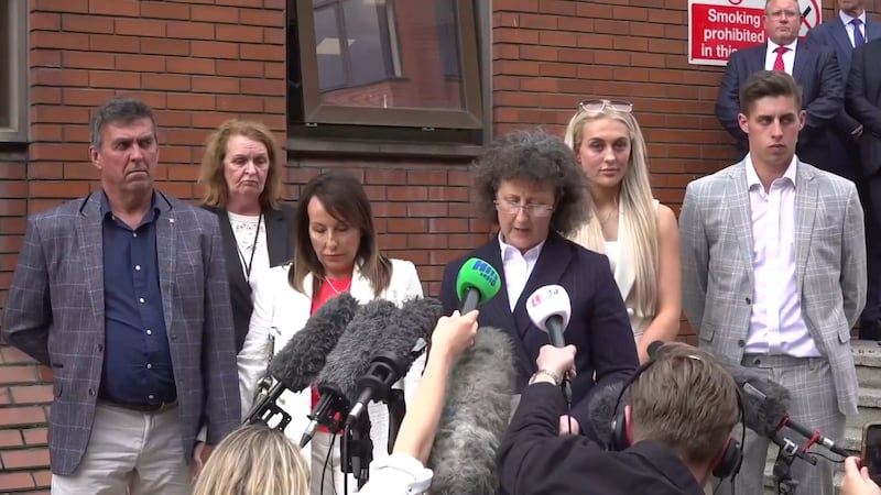 Family liaison officer Linzie Holroyd reading a statement on behalf of Paul Beshenivsky (left), his new wife Michelle (third from left), daughter Lydia Beshenivsky (second from right) and son Paul Beshenivsky Jnr (right) outside Leeds Crown Court