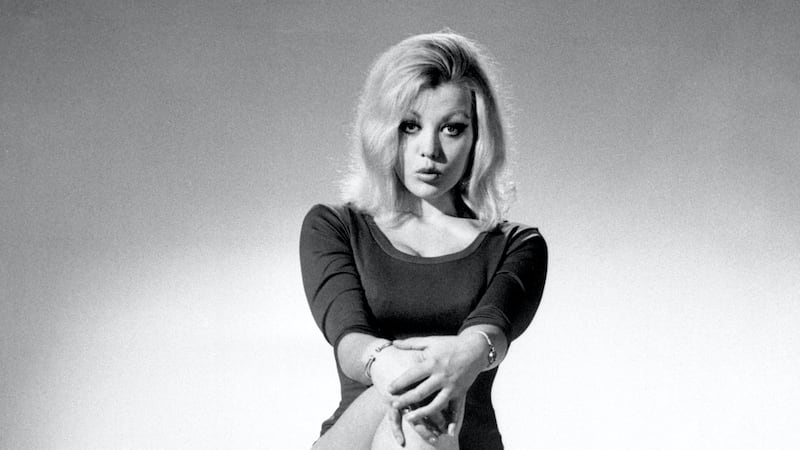 The actress is known for her role as the gold-painted model in the title sequence in Goldfinger.