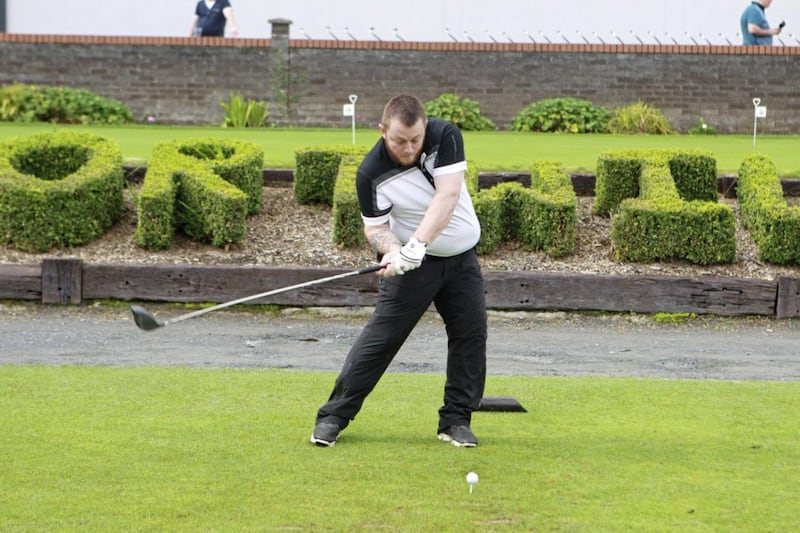 Snooker player Mark Allen tees off at the Oscar Knox cup at Fortwilliam Golf Club. Picture by Matt Bohill 