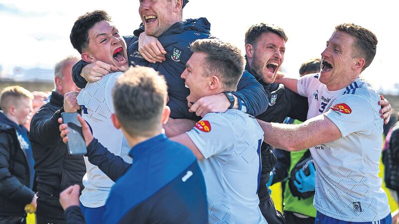 Kieran Duffy (far right) celebrates with team-mates and Monaghan boss Vinny Corey in the wake of Sunday's victory over Mayo. Picture by Sportsfile