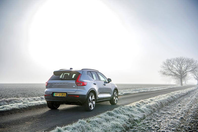Image of the back of the new Volvo XC40 driving down a frosty road