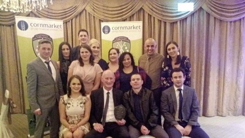 The staff from Antrim Allianz Cumann na mBunscol school Gaelscoil na bhFal, pictured with Kilkenny manager Brian Cody, after finishing third in the &lsquo;Promotion of Gaelic Games in schools with less than 150 pupils&#39; at the National Cumann na mBunscol awards 