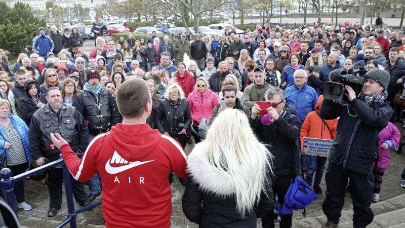 Hundreds of people gathered in Bangor on Monday evening in support of a girl who was attacked on the town&#39;s pier at the weekend. David Chapman and Georgia Pemberton, friends of the victim, speaking to the crowd. Picture by Cliff Donaldson 