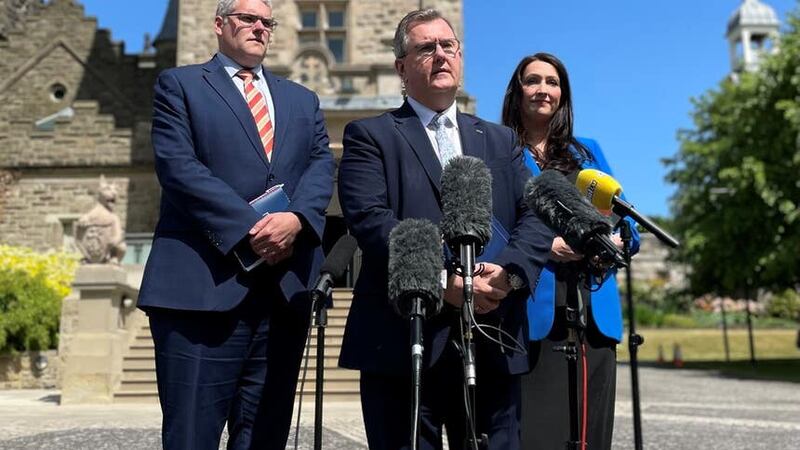 DUP leader Sir Jeffrey Donaldson along with party colleagues Gavin Robinson and Emma Little Pengelly outside Stormont Castle after a meeting with the head of the NI Civil Service Jayne Brady (David Young/PA)