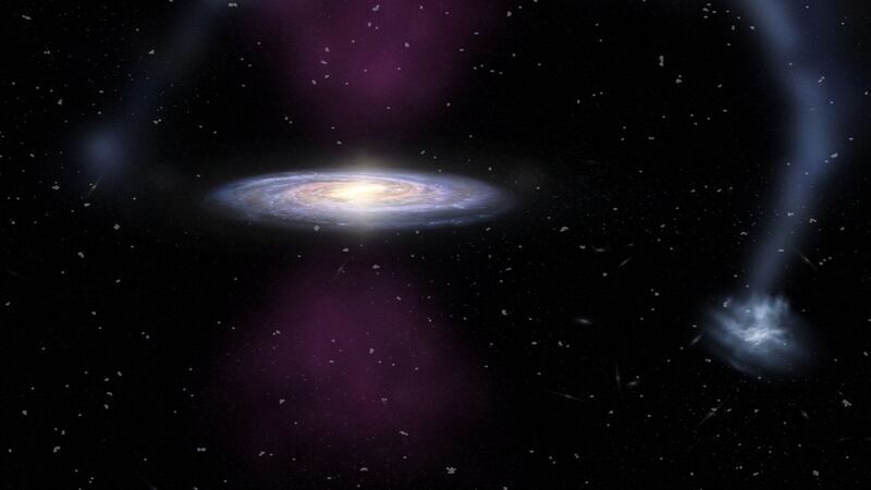 The high-energy radiation sliced through the galaxy and hit surrounding material.
