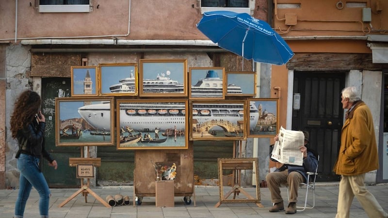 The paintings appear to satirise the anchoring of large cruise liners next to Venice’s Grand Canal.
