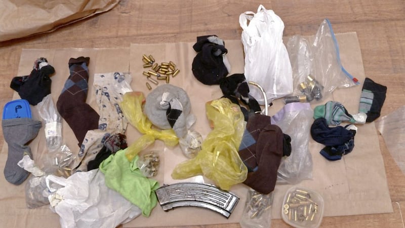 Assorted ammunition taken from paper sack in roof space 