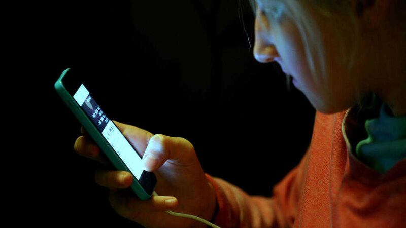 While nearly three quarters of children own a mobile phone, half of parents don&#39;t allow them to spend their own pocket money on digital downloads, figures show 
