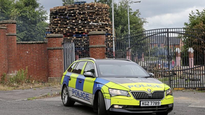 Police at the peace line on Duncairn Gardens in north Belfast where a bonfire in being built. Picture by Mal McCann 