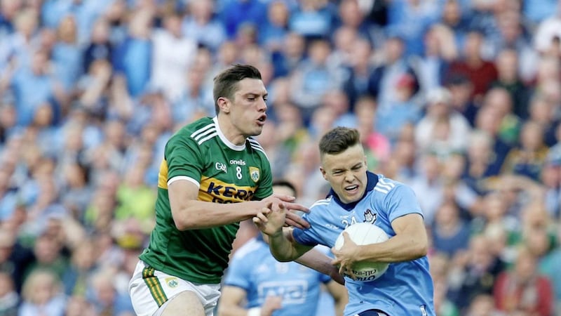 Dublin&#39;s Eoin Murchan and Kerry&#39;s David Moran battle it out. Pic Philip Walsh. 