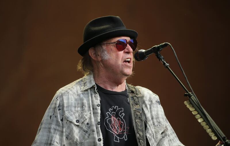 Neil Young performs during the British Summer Time festival at Hyde Park in London.