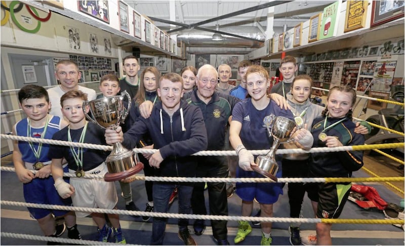 Gerry Storey at Holy family Boxing Club with young boxers including Paddy Barnes and Michaela Walsh. Picture by Hugh Russell 