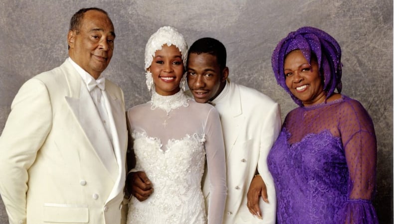 Whitney Houston with her father and mother John and Cissy Houston and her husband Bobby Brown 