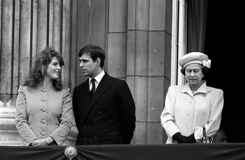 Sarah Ferguson and Andrew on the balcony with the then Queen