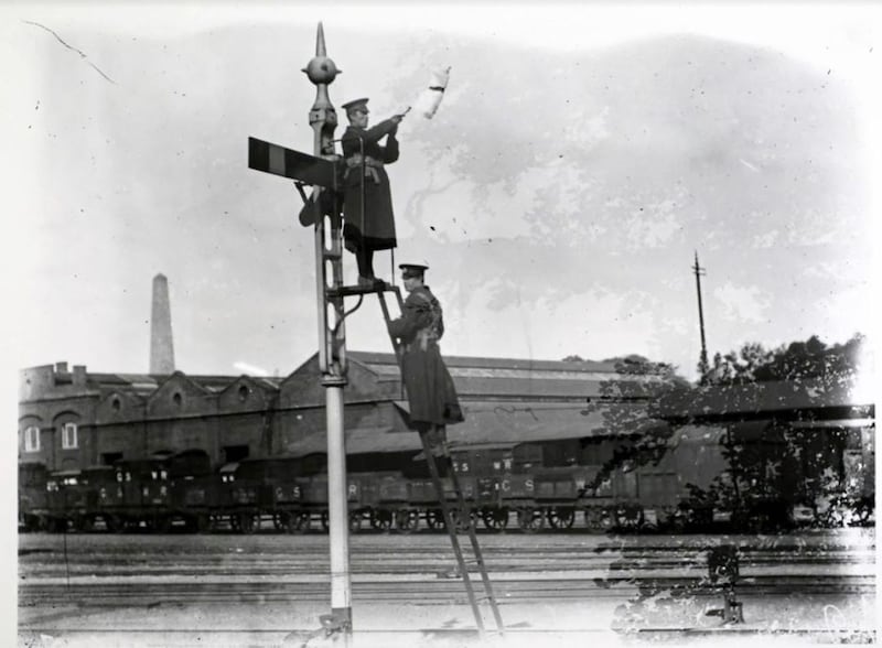 A soldier signalling &lsquo;line clear&rsquo; during the Irish railway strike in September 1911 