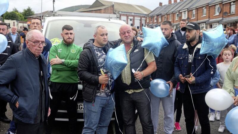 Liam O&#39;Keefe pictured receiving support from the Ardoyne community at a vigil in Brompton Park last week. His son, baby Liam, will be buried today. Picture by Mal McCann 