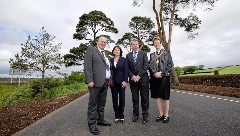 From left, Paul Reid, Mayor of Mid and East Antrim, Deidre Mackle, Divisional Roads Manager, William Diver, BAM McCann jv and Joan Baird, Mayor of Causeway Coast and Glens. Picture by Kelvin Boyes/Press Eye 