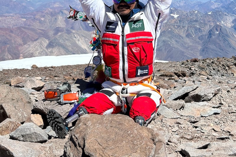 Double-amputee mountaineer climbs tallest mountain in southern hemisphere