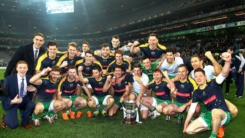 Ireland players celebrate with the Cormac McAnallen Cup after triumphing over Australia in Saturday's International Rules test