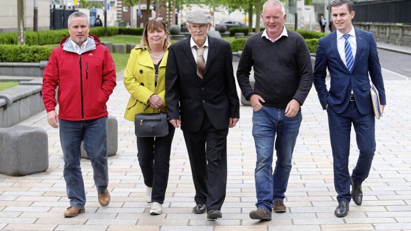 Aidan McAnespie&#39;s cousin John Gormley, sister Margo, father John, brother Vincent and family solicitor Darragh Mackin following a meeting with the PPS. Picture by Mal McCann 