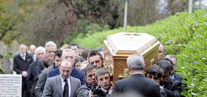 Aodh&aacute;n Ward carrying his father Nishi Ward&#39;s coffin at his funeral in November 