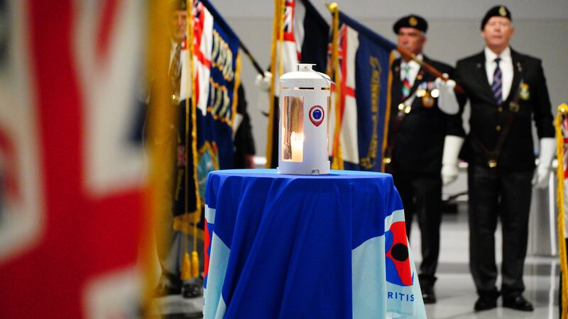 France’s Freedom Flame is displayed during a ceremony at Portsmouth International Port