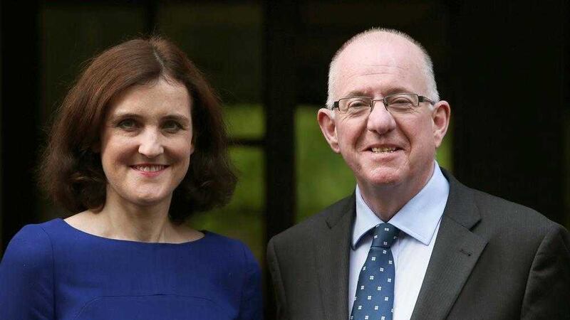 Secretary of State for Northern Ireland Theresa Villiers and Republic of Ireland Minister for Foreign Affairs Charlie Flanagan who will both be at the ongoing talks to help save Stormont. Picture: Brian Lawless/PA Wire 