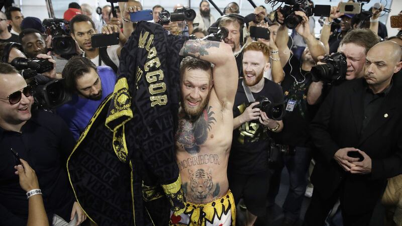 Dubliner Conor McGregor surrounded by media and supporters during a workout Friday Aug11 2017, in Las Vegas. McGregor is scheduled to fight Floyd Mayweather Jr. in a boxing match August 26 in Las Vegas.&nbsp;