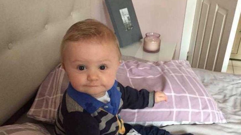 Baby Alex McCarthy died four days after he is believed to have fallen from his bath seat into water at his Lurgan home 