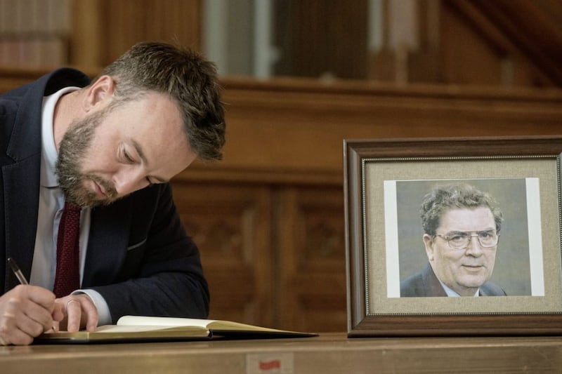 SDLP leader Colum Eastwood signs the Book of Condolence in Derry&#39;s Guildhall. 