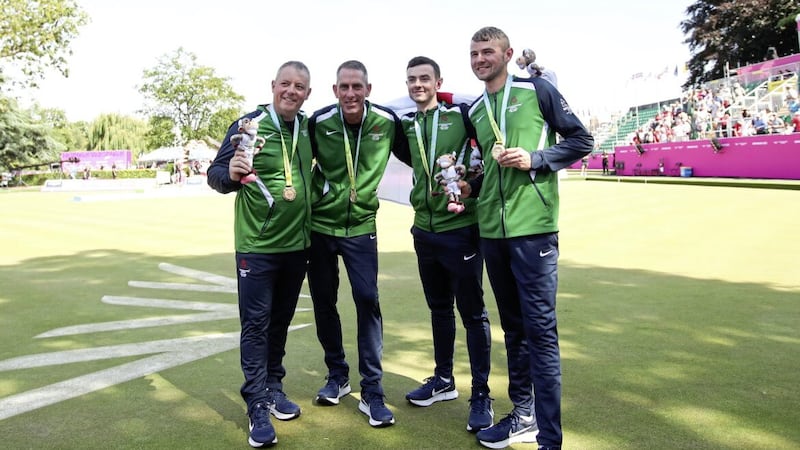 Northern Ireland&rsquo;s Ian McClure, Adam McKeown, Sam Barkley and Martin McHugh pose for a photograph after winning a gold medal during Men&#39;s Fours Lawn Bowls - medal ceremony at Victoria Park on day nine of the 2022 Commonwealth Games in Birmingham Picture: Isaac Parkin/PA 