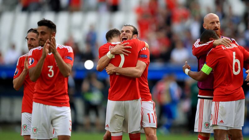 Wales' Chris Gunter, celebrating here with Gareth Bale, has defended the squads decision to celebrate England's exit from Euro 2016 last night&nbsp;