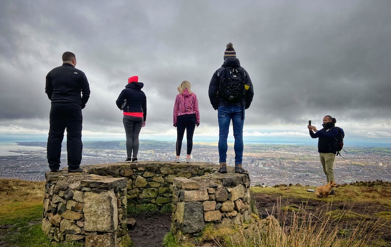 Posing for a picture after a climb up Divis Mountain. Picture by Mal McCann