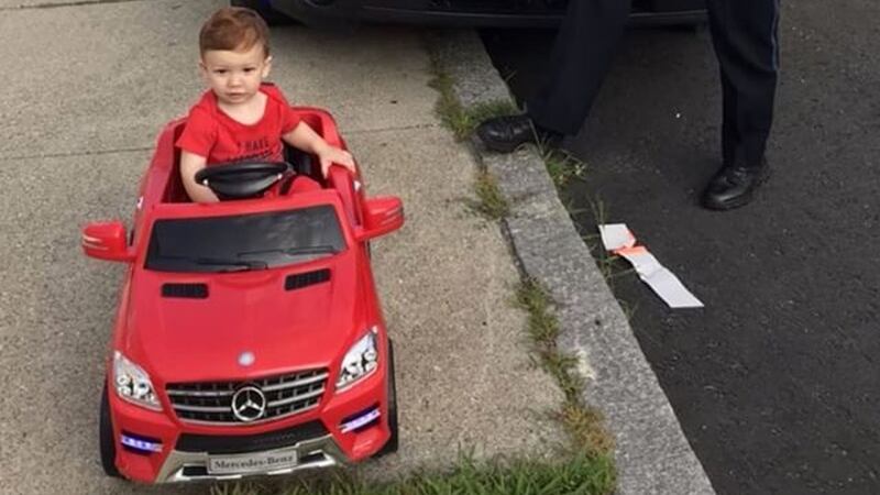 Police in the Boston suburb of Malden spotted one-year-old Grayson Salerno in a red toy Mercedes convertible.