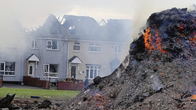 A loyalist bonfire on Housing Executive land in west Belfast&#39;s Shankill area damaged several homes. Picture by Hugh Russell 