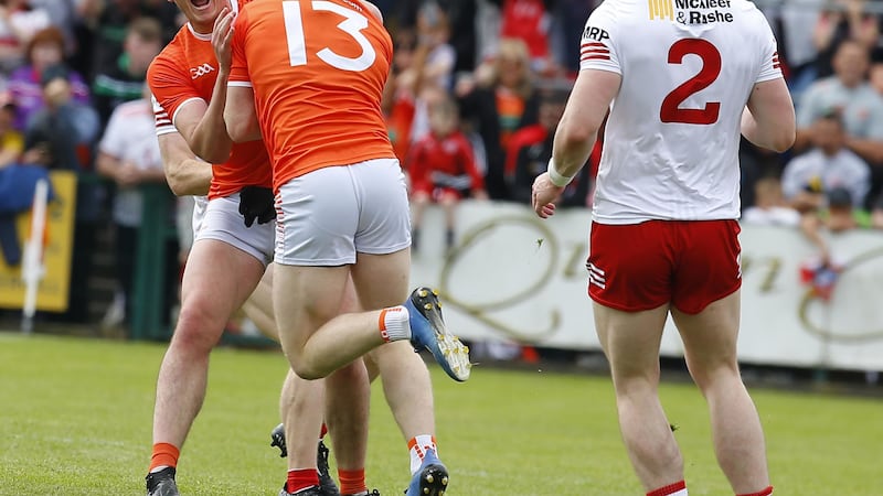 Armagh's Aidan Nugent  celebrates his goal with team-mate Aaron McKay during the  All-Ireland SFC Round One win over Tyrone  at the Athletic Grounds                                   Picture: Philip Walsh.&nbsp;