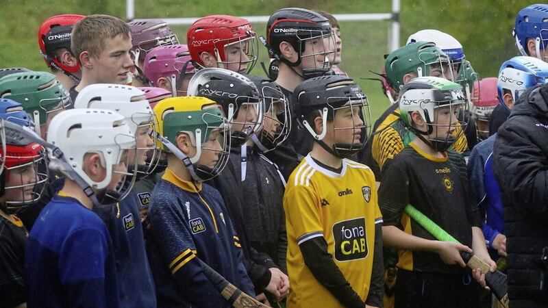 St Mary&#39;s pupils listen intently to some of the Antrim hurlers Picture: Kevin Herron 
