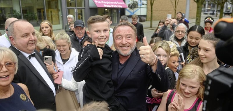 A young fan met Michael Flatley at the Waterfront Hall. Picture by Mark Marlow 