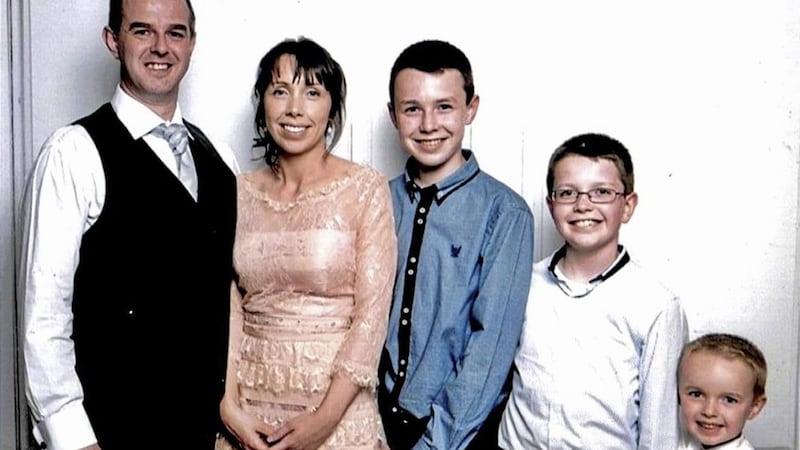 Alan Hawe with his wife Clodagh and their children Liam (13), Niall (11) and Ryan (6). Picture from Press Association 
