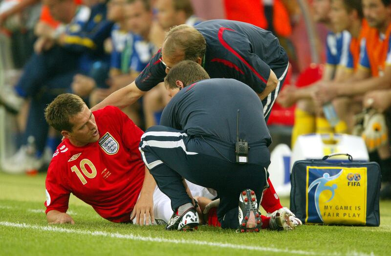 Michael Owen receives treatment for an injury at the 2006 World Cup