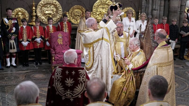 King Charles III is crowned with St Edward&#39;s Crown by Archbishop of Canterbury Justin Welby, who also invited people to join him in a pledge of loyalty to the new monarch. Picture by Victoria Jones/PA Wire 